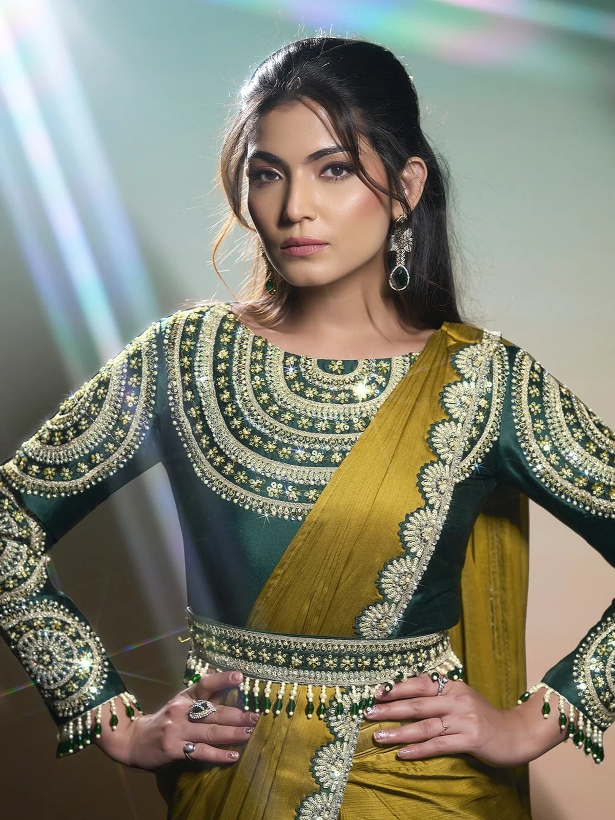Tarani Gaura mustard Georgette Chiffon Satin saree front view with detailed stitched designer blouse