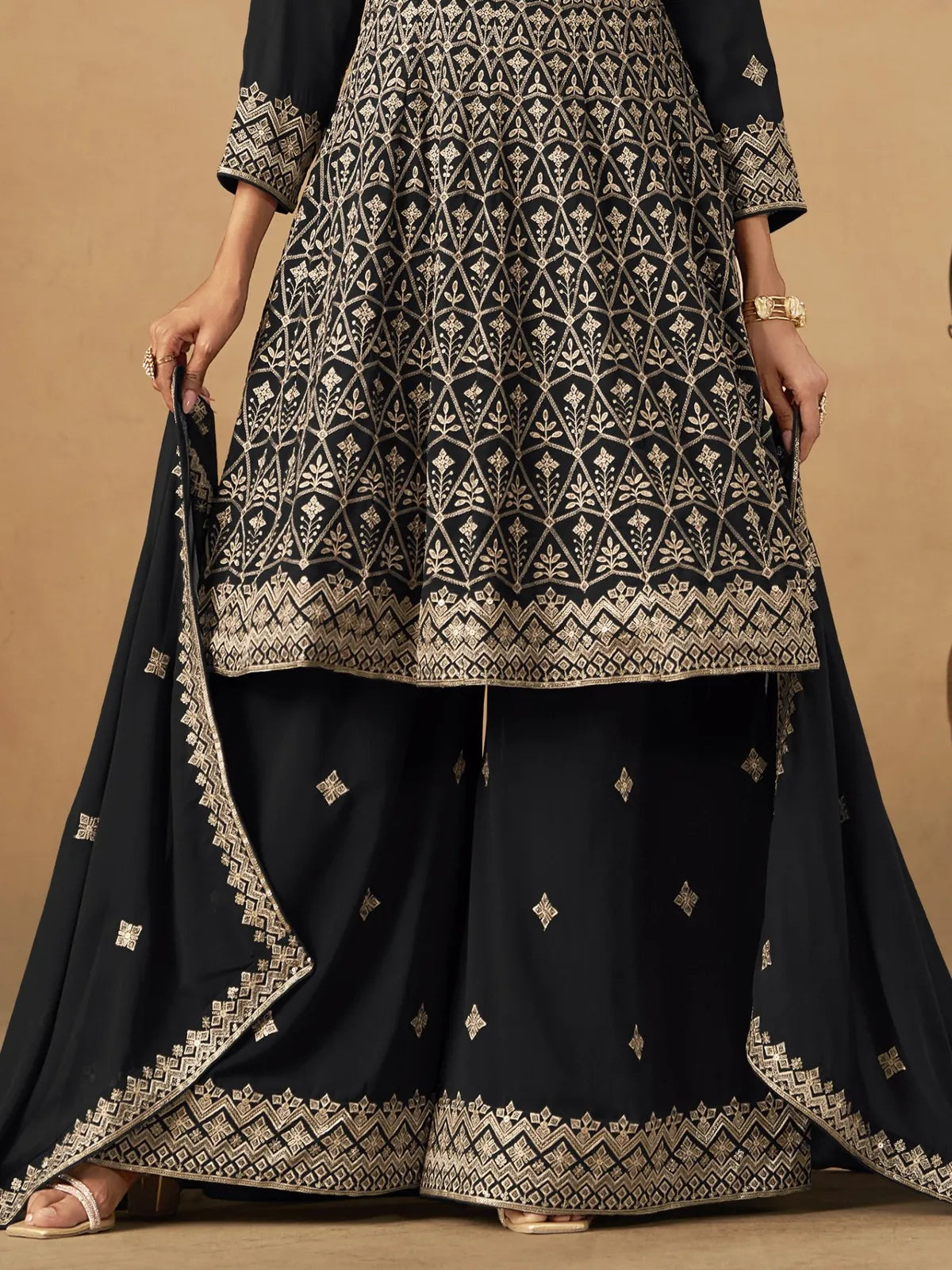 Tarani black georgette dress closeup view of embroidery and fabric detailing
