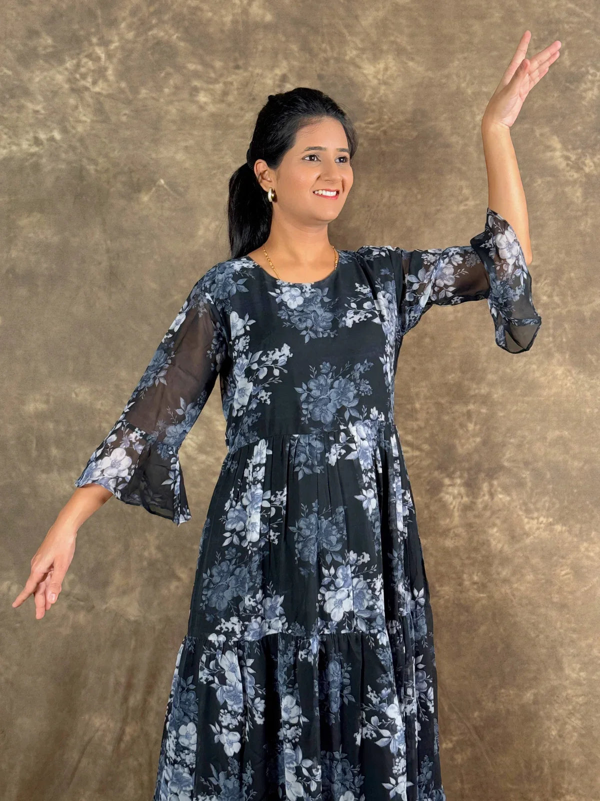 Tarani premium black georgette midi dress with floral design upper body view