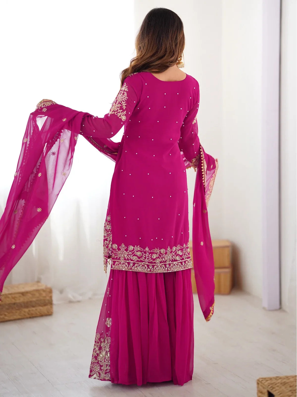 Tarani magenta georgette dress back view with embroidered details