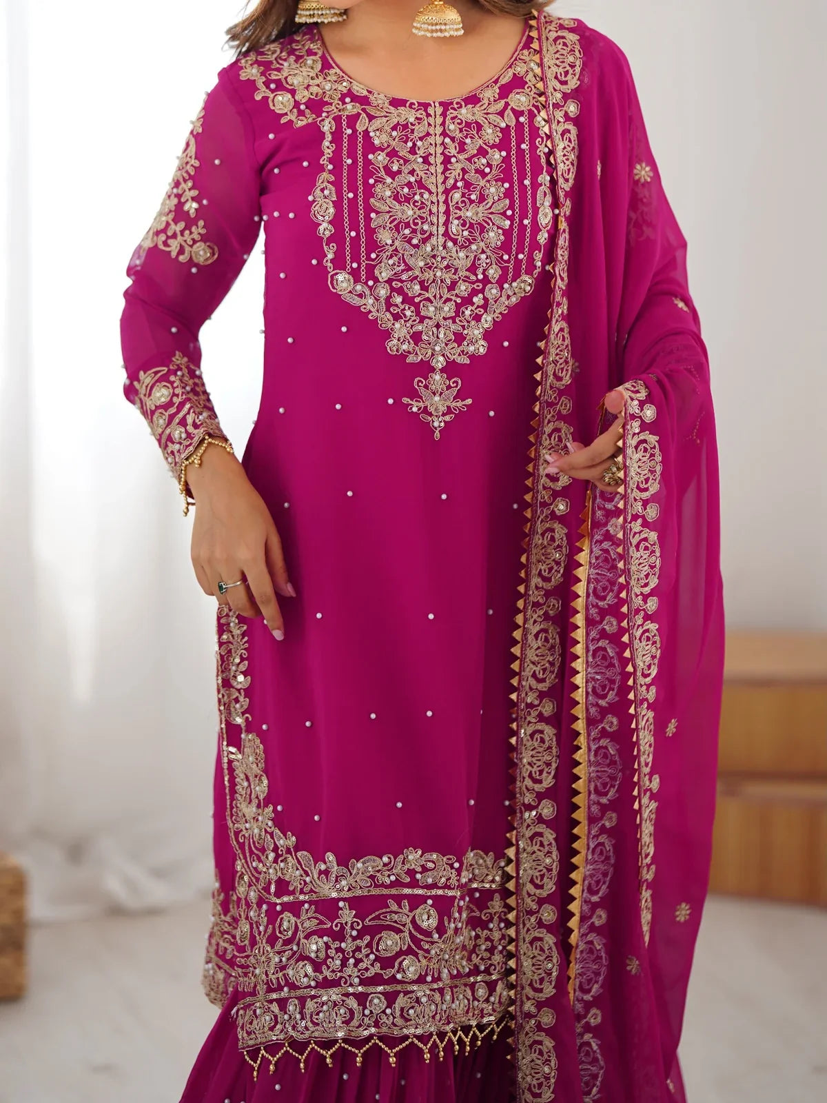Tarani magenta georgette dress front pose with dupatta and sharara