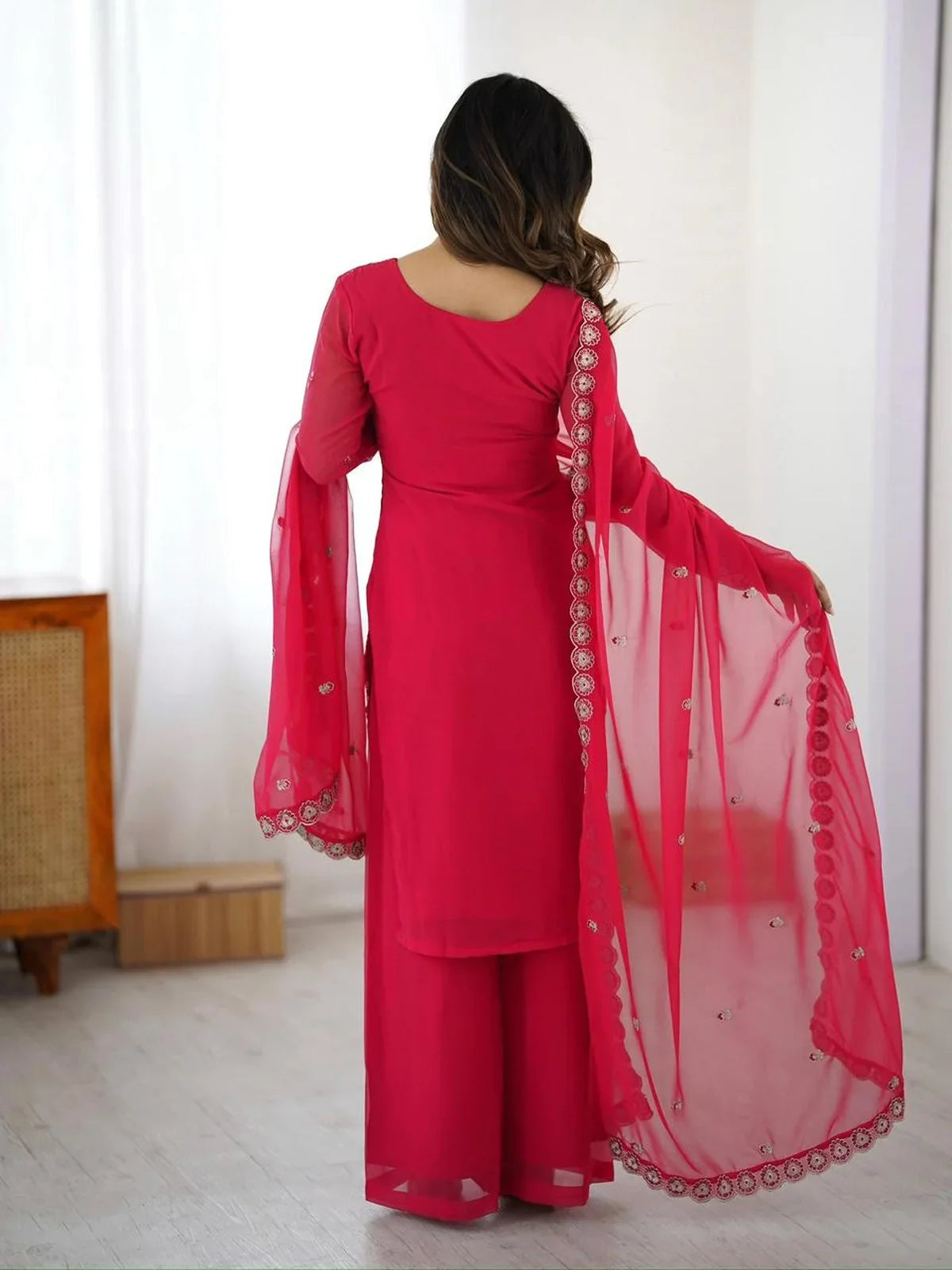 Tarani pink faux georgette festive palazzo dress back side showing plain back with flowing dupatta