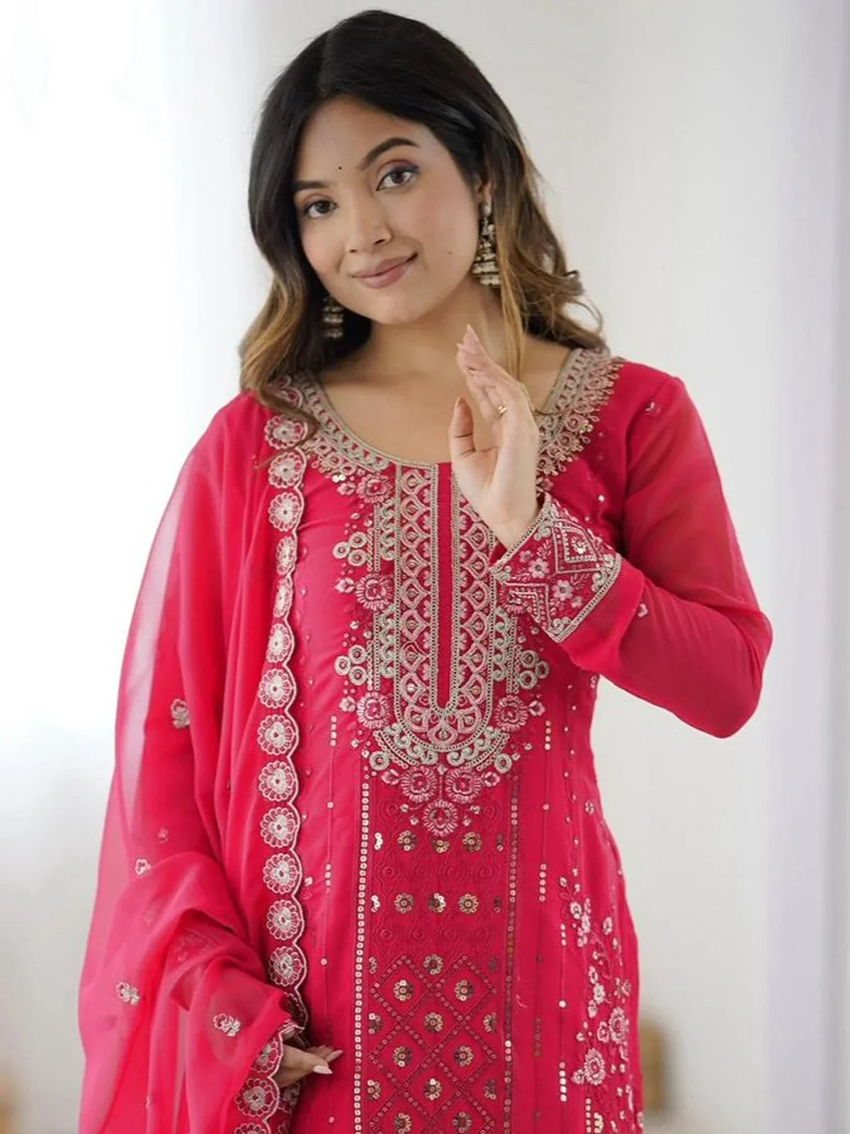 Tarani festive pink faux georgette dress upper body closeup with zari embroidery and sleeve details