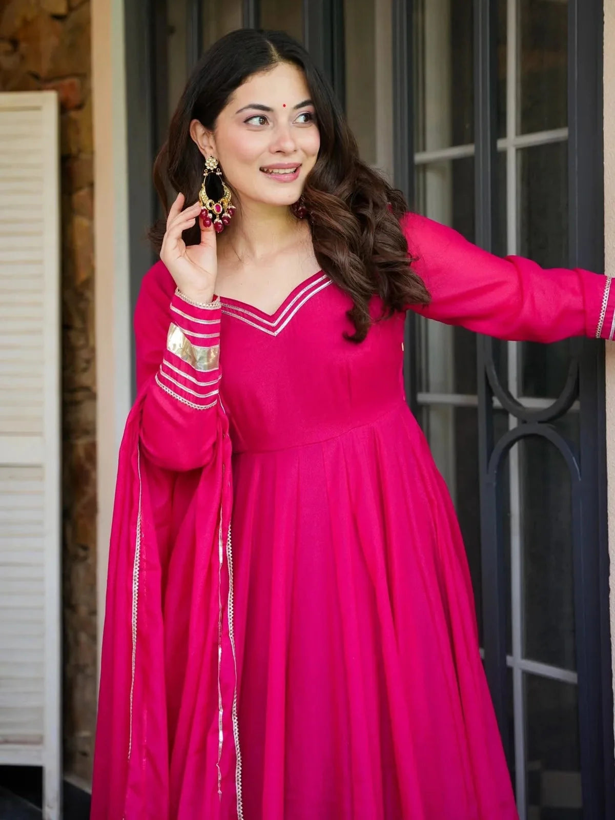 Tarani elegant pink georgette dress upper body view showing neckline and sleeves design