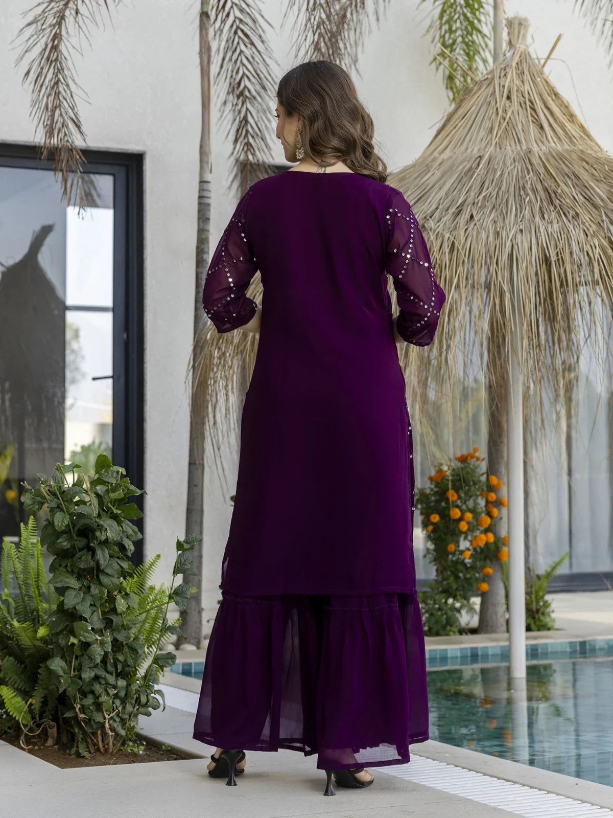 Tarani purple embroidered georgette dress with sharara pant and back design - back view