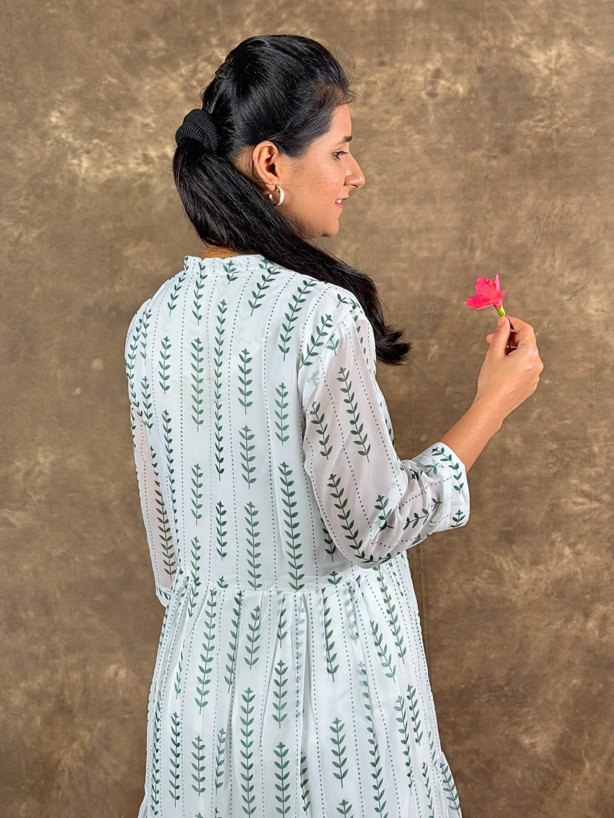 Tarani white georgette midi dress back view with leafy prints