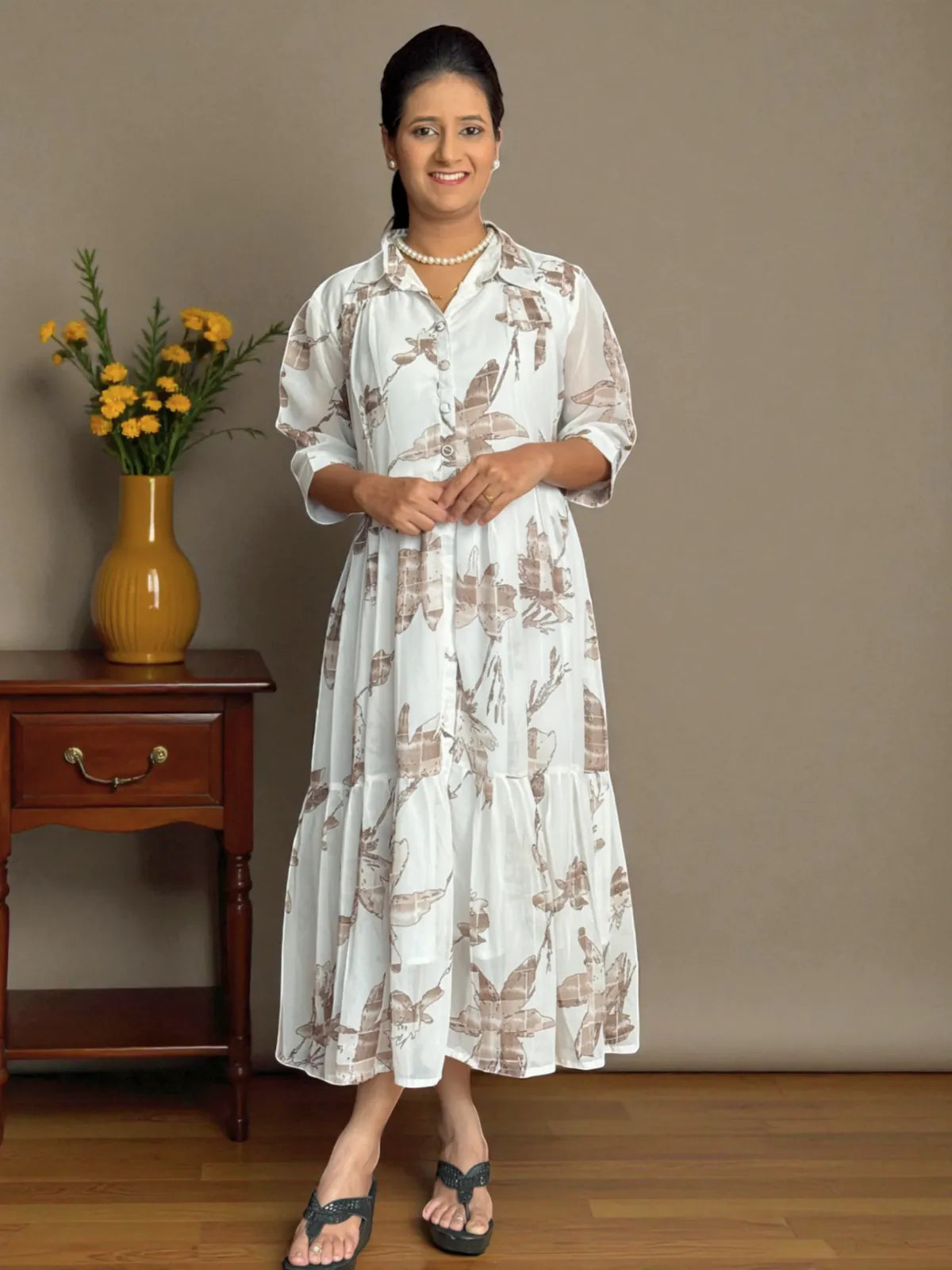 Tarani floral printed georgette midi dress in white showing front styling full pose