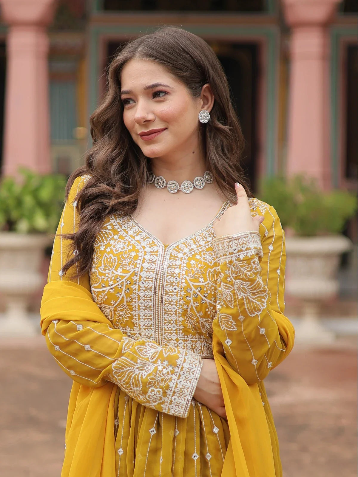 Tarani yellow georgette embroidered dress close-up showing neckline and sleeves detailing