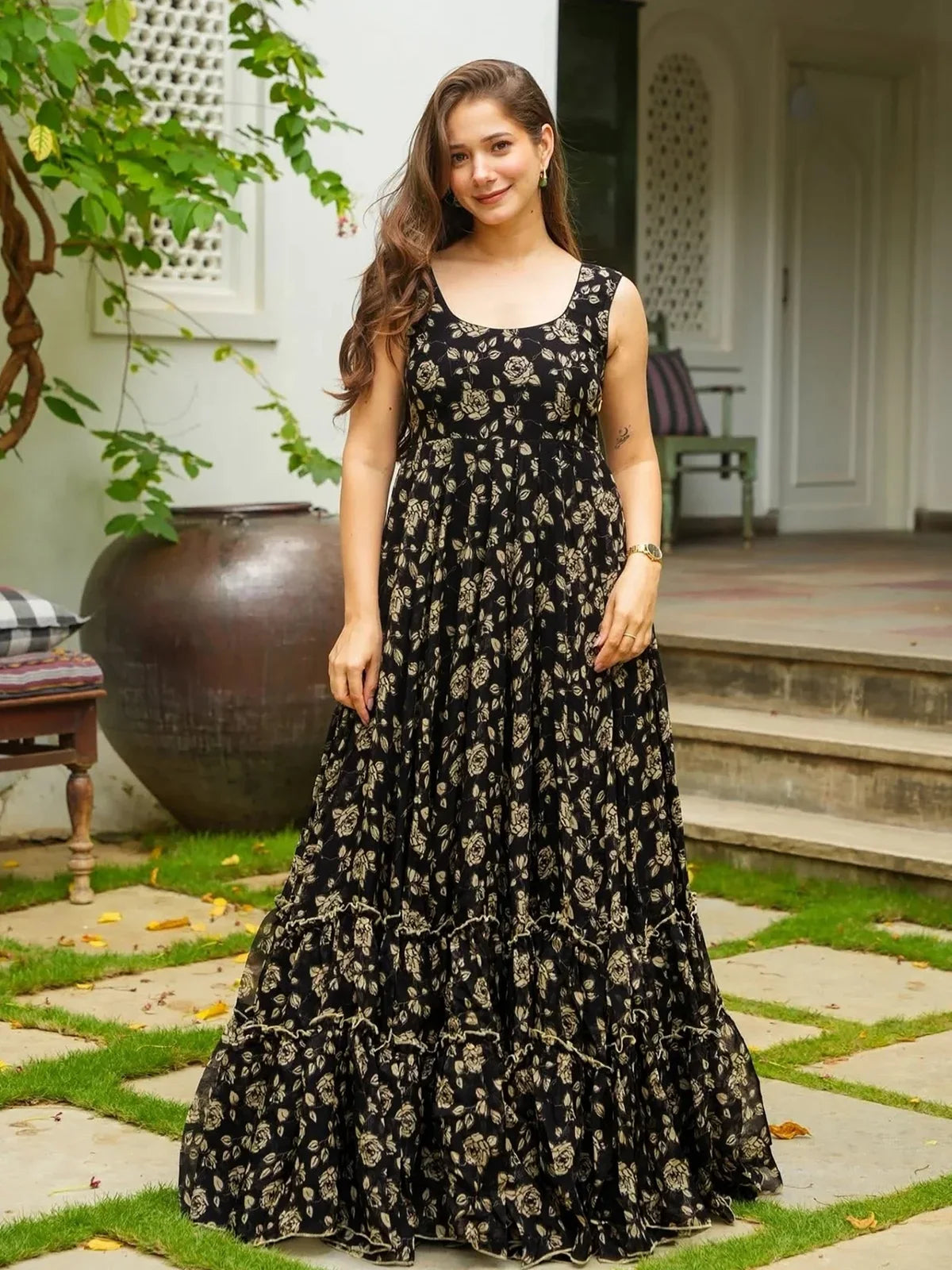 Tarani black georgette sleeveless gown with floral print front view, perfect for festive wear
