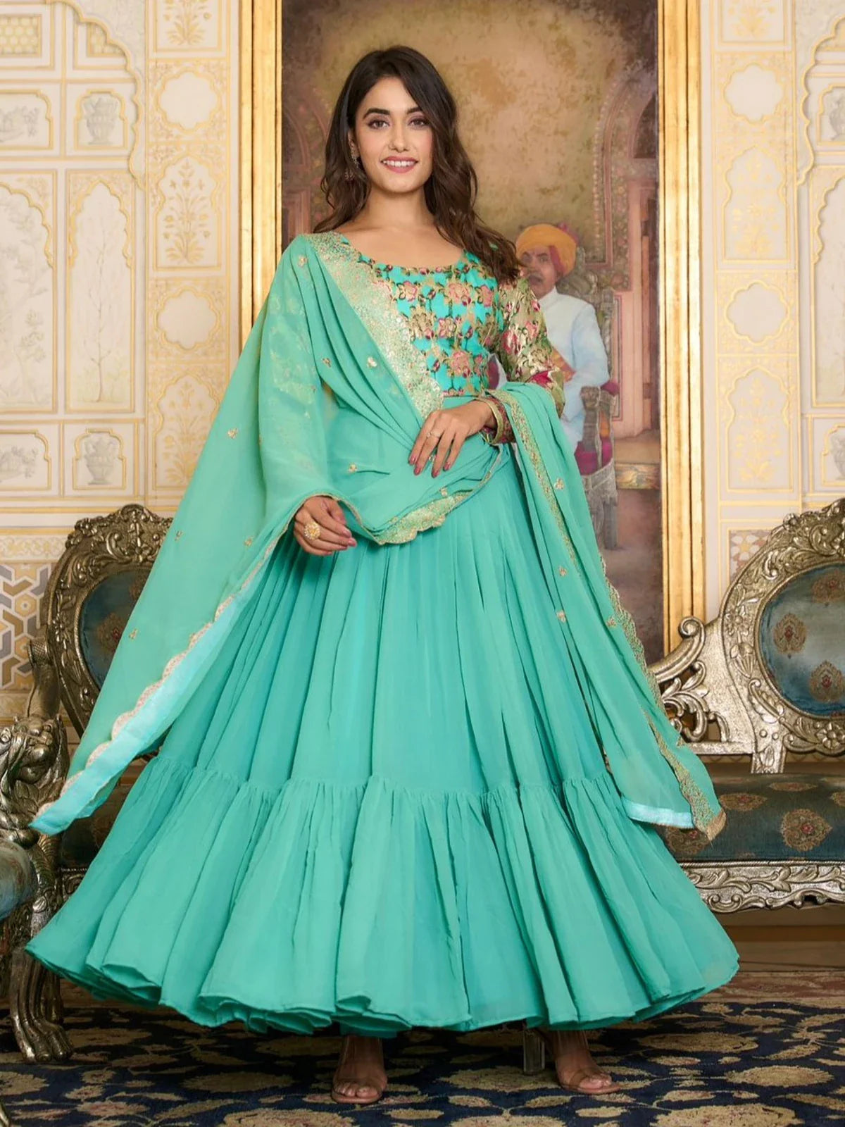 Tarani full view of flowy green georgette gown with 5.5 meter flare and embroidered work