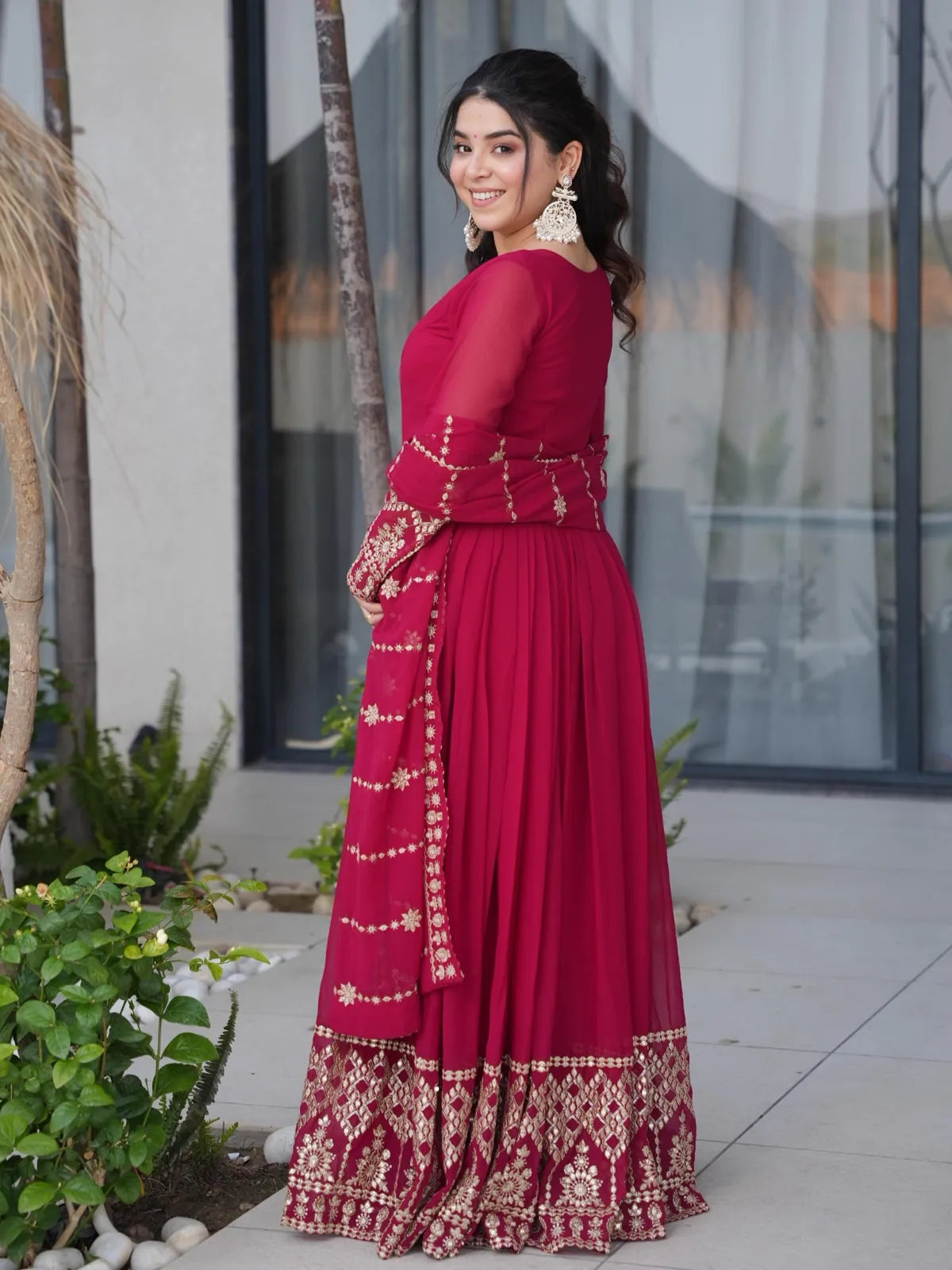 Tarani maroon georgette gown back view with detailed embroidery and soft flow