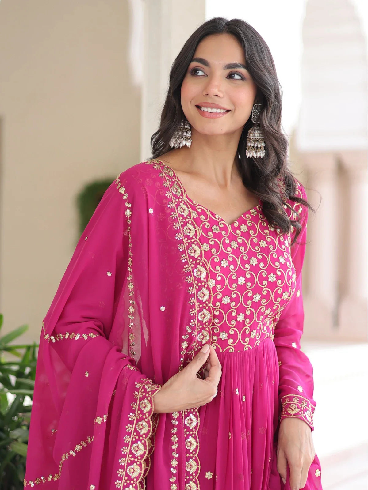 Tarani designer pink georgette gown with embroidery closeup on neckline and sleeves