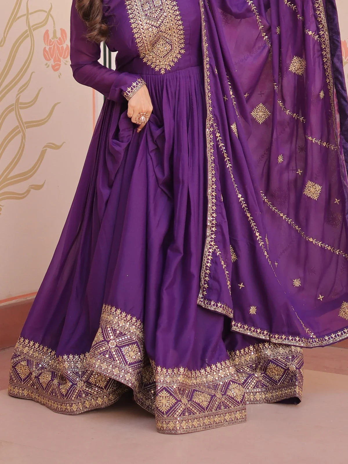 Tarani purple georgette gown closeup of zari and sequins embroidery