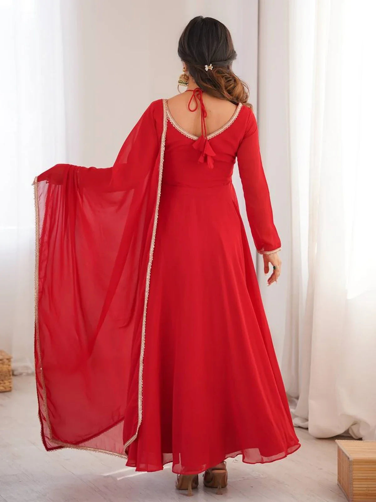 Tarani red georgette gown back design with dori tie-up and flowing dupatta