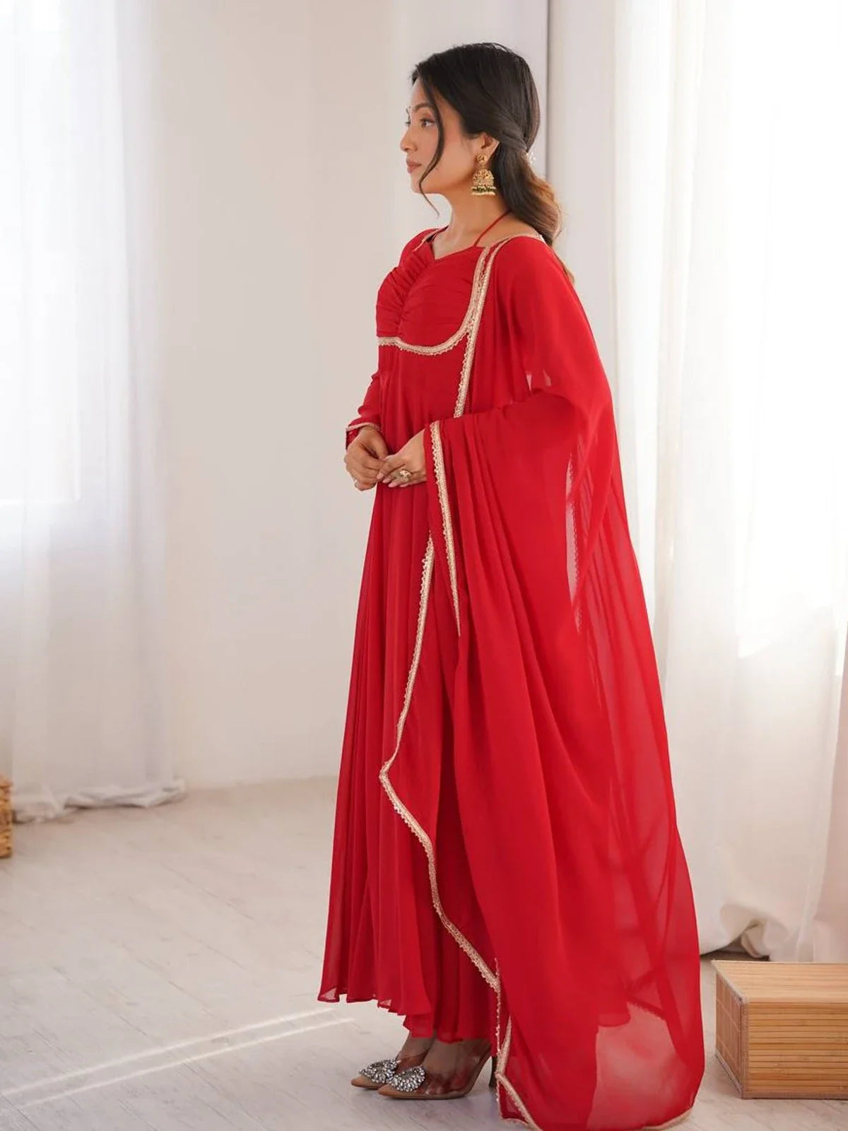 Tarani red georgette gown side profile showing sleeve fit and dupatta drape