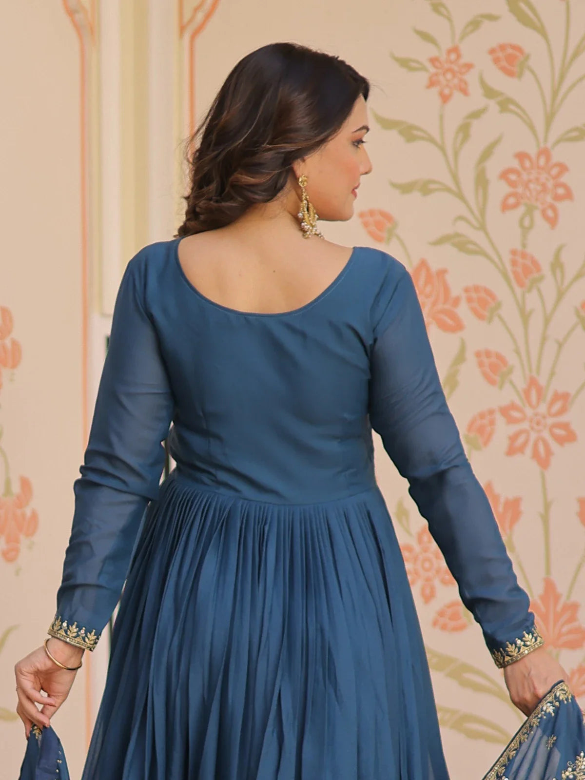 Tarani teal gown back view showing elegant full sleeves and classic round neck design