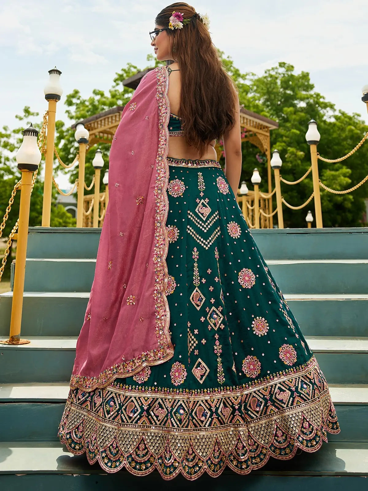 Tarani green georgette lehenga back design with embroidered motifs and pink dupatta drape Ashmika