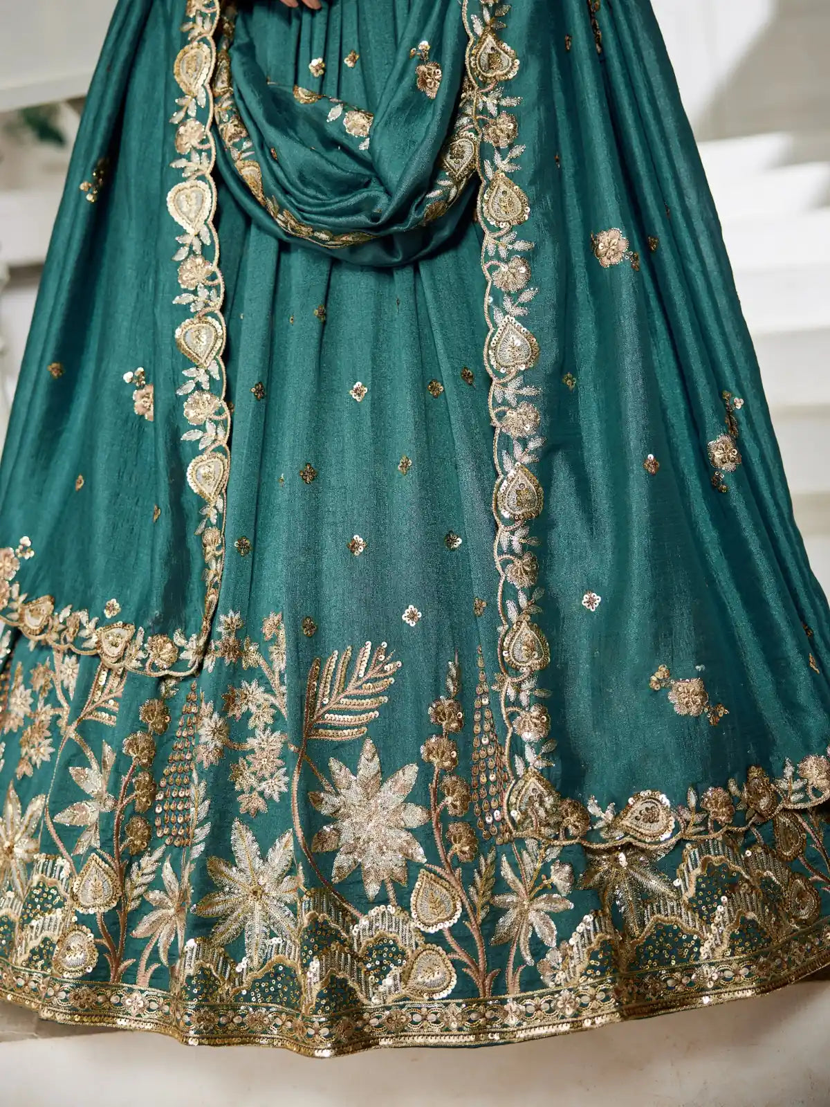 Tarani green georgette lehenga closeup of embroidery and border details