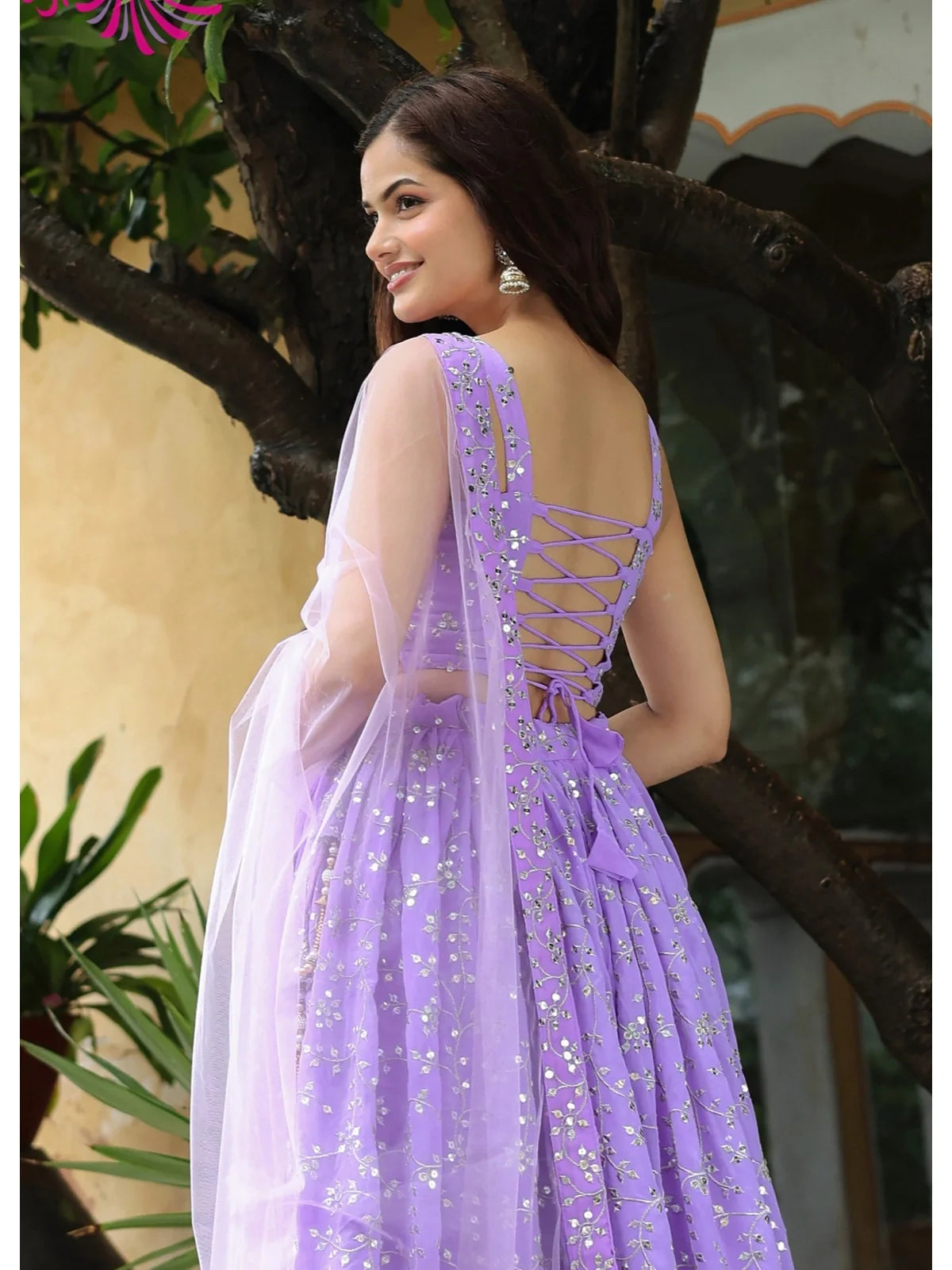 Tarani lavender georgette lehenga back view with tie blouse design