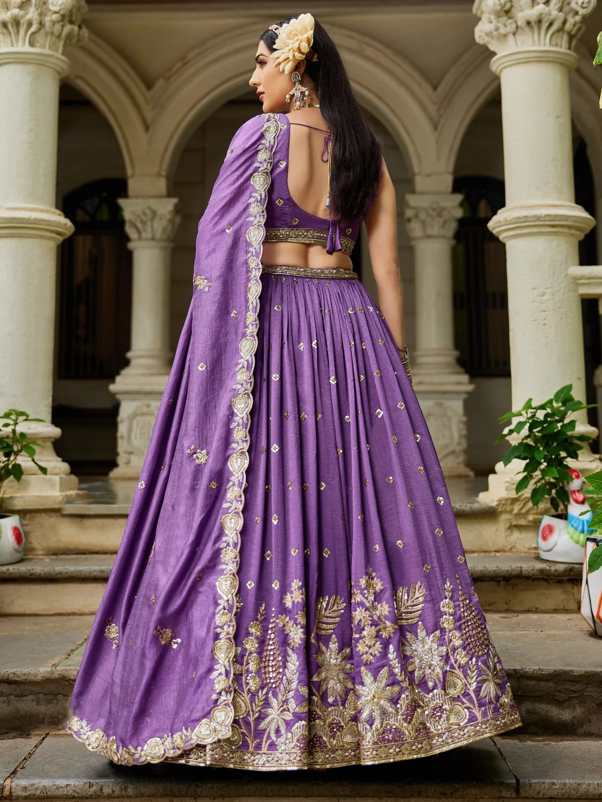 Tarani purple georgette lehenga back view showing blouse and dupatta drape