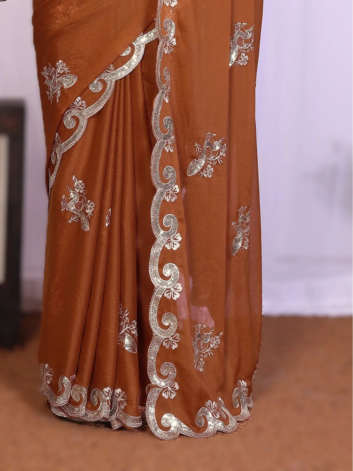 Tarani shuchi Brown Georgette saree close up view for festive party and wedding wear