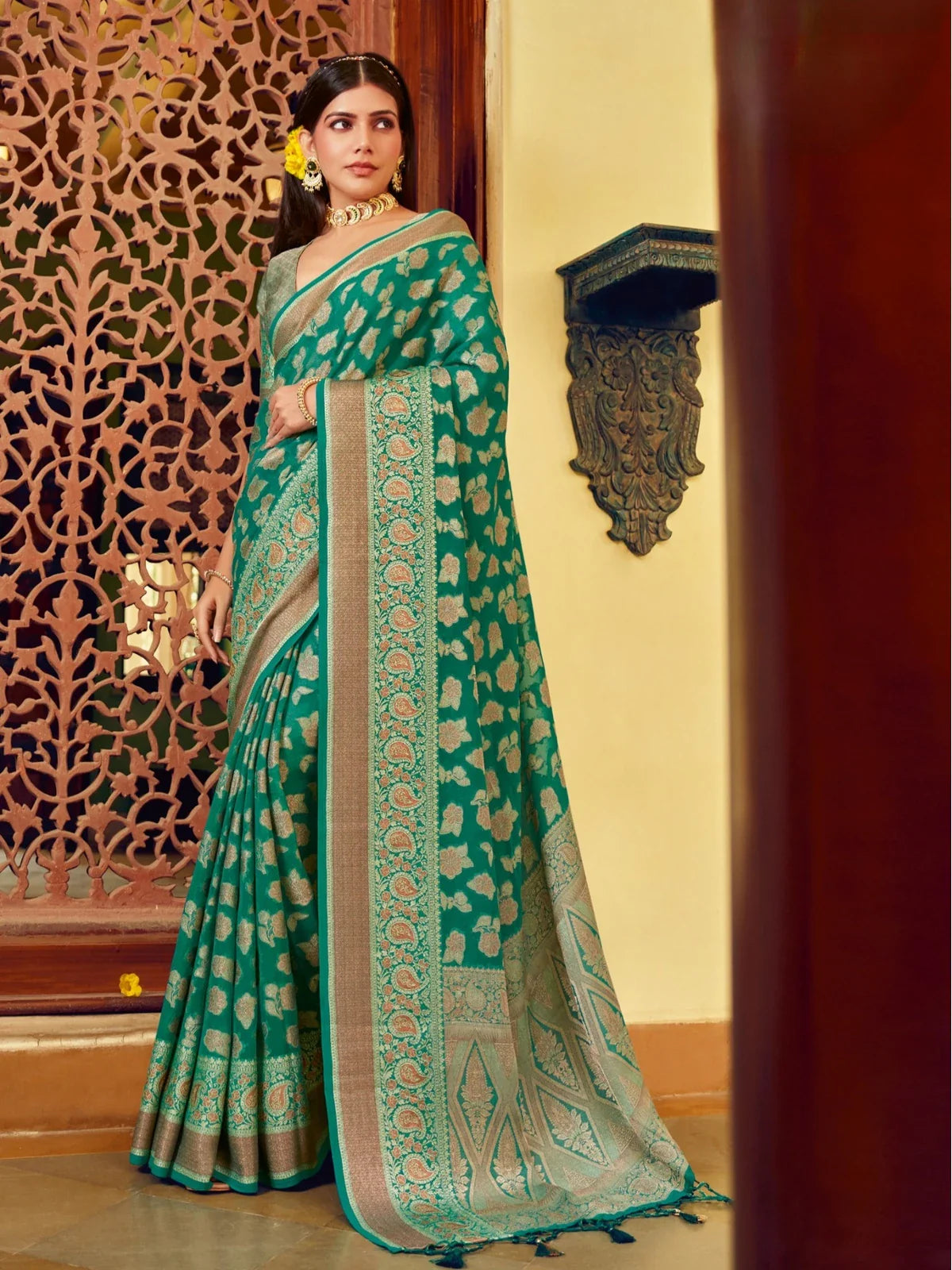 Tarani premium green georgette saree with weaving buta border and pallu full view