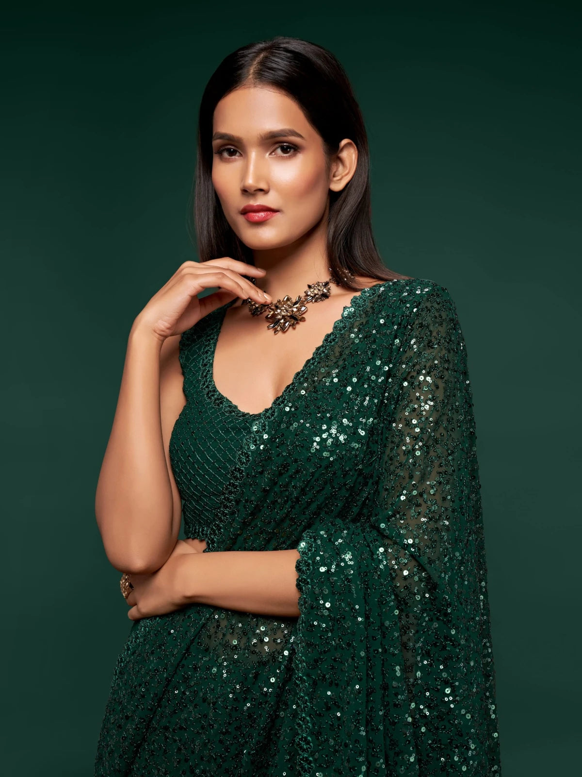 Tarani green georgette saree upper body view with sequins embroidery blouse detailing