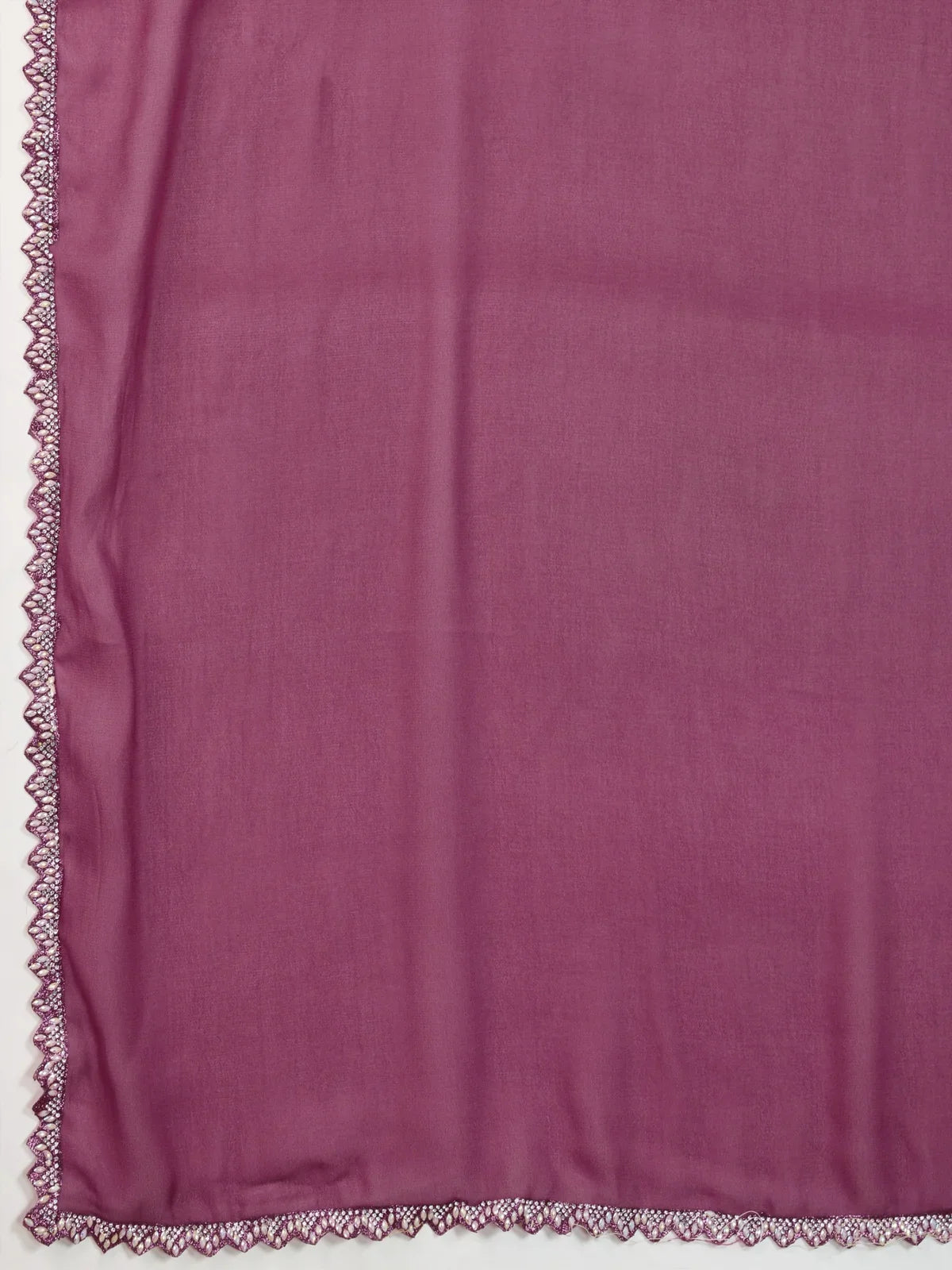 Tarani magenta georgette saree fabric close-up with delicate lace border