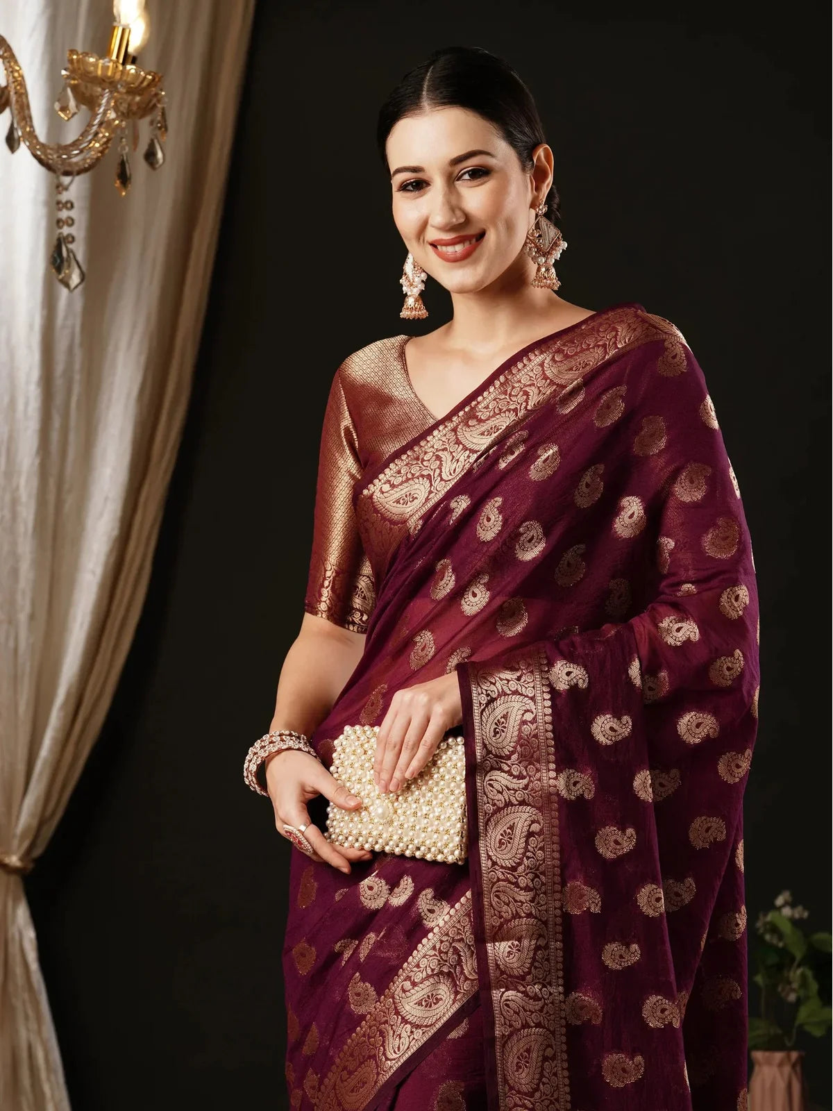 Tarani maroon georgette saree with elegant zari motifs and blouse upper body view