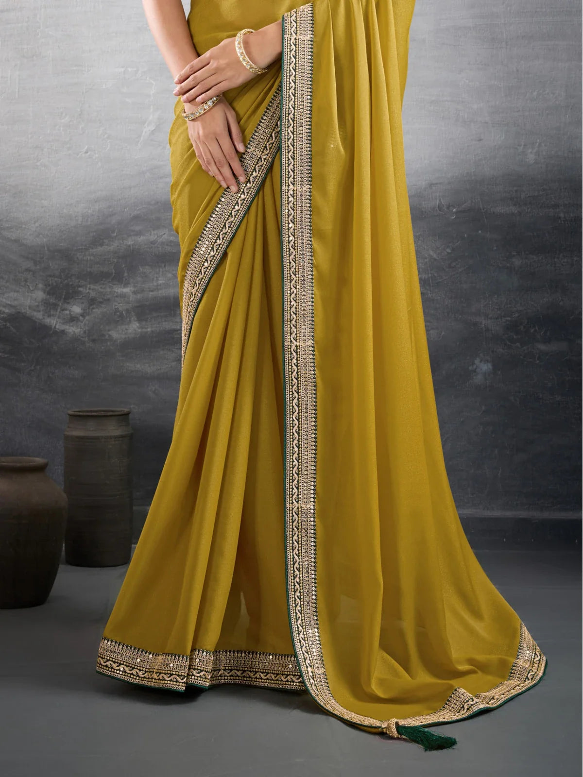 Tarani mustard georgette saree closeup detailing with embroidered blouse for festive and party wear