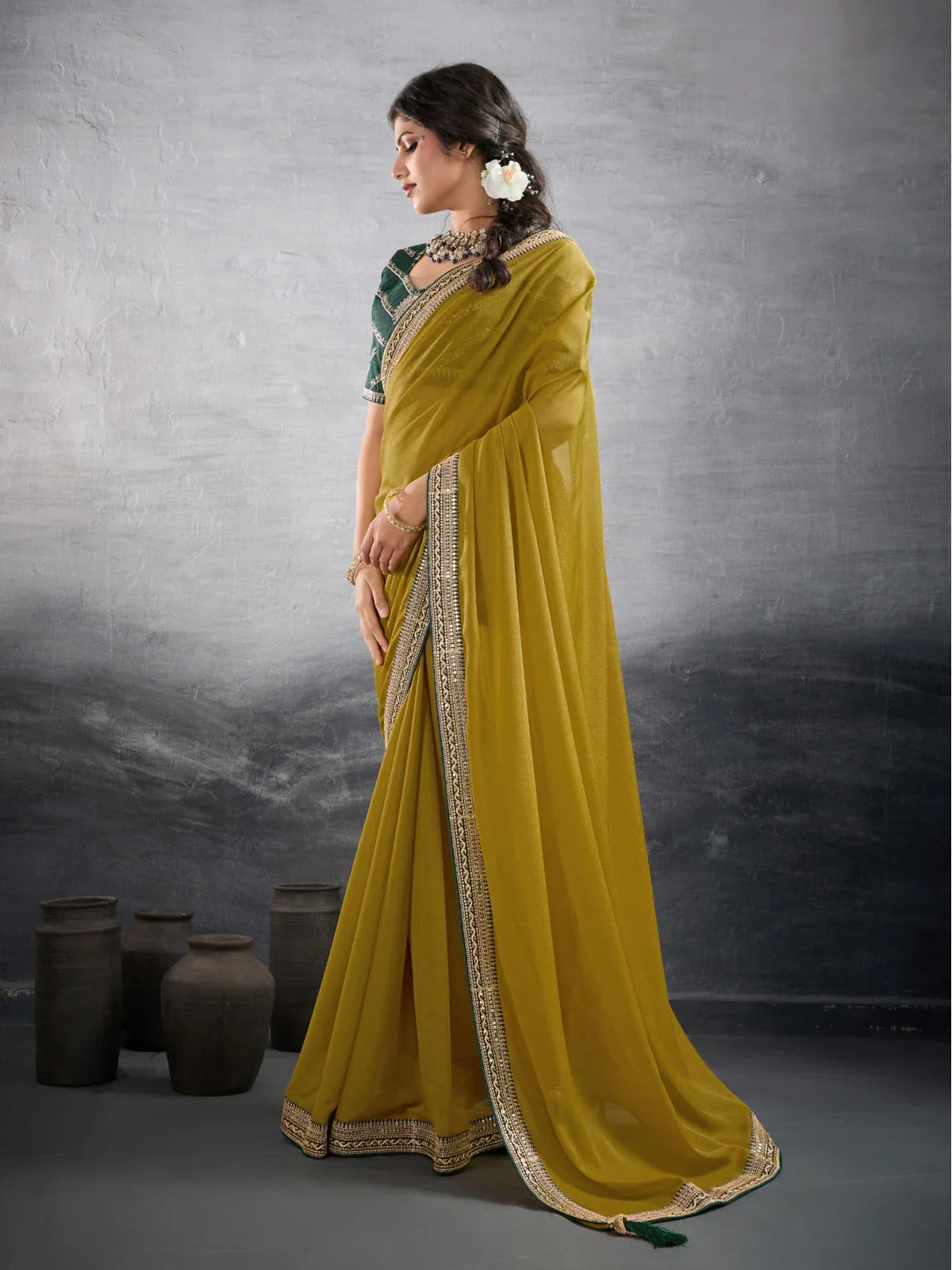 Tarani mustard yellow georgette saree with embroidered Banglori silk blouse for festive and party wear