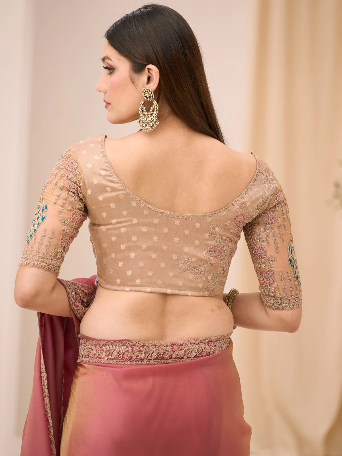 Tarani Pallavika brocade zari blouse back view with pink tissue georgette saree
