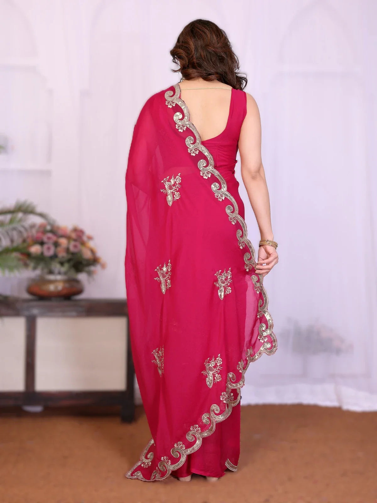 Tarani rasivika Pink Georgette saree drape detail view for festive party and wedding wear