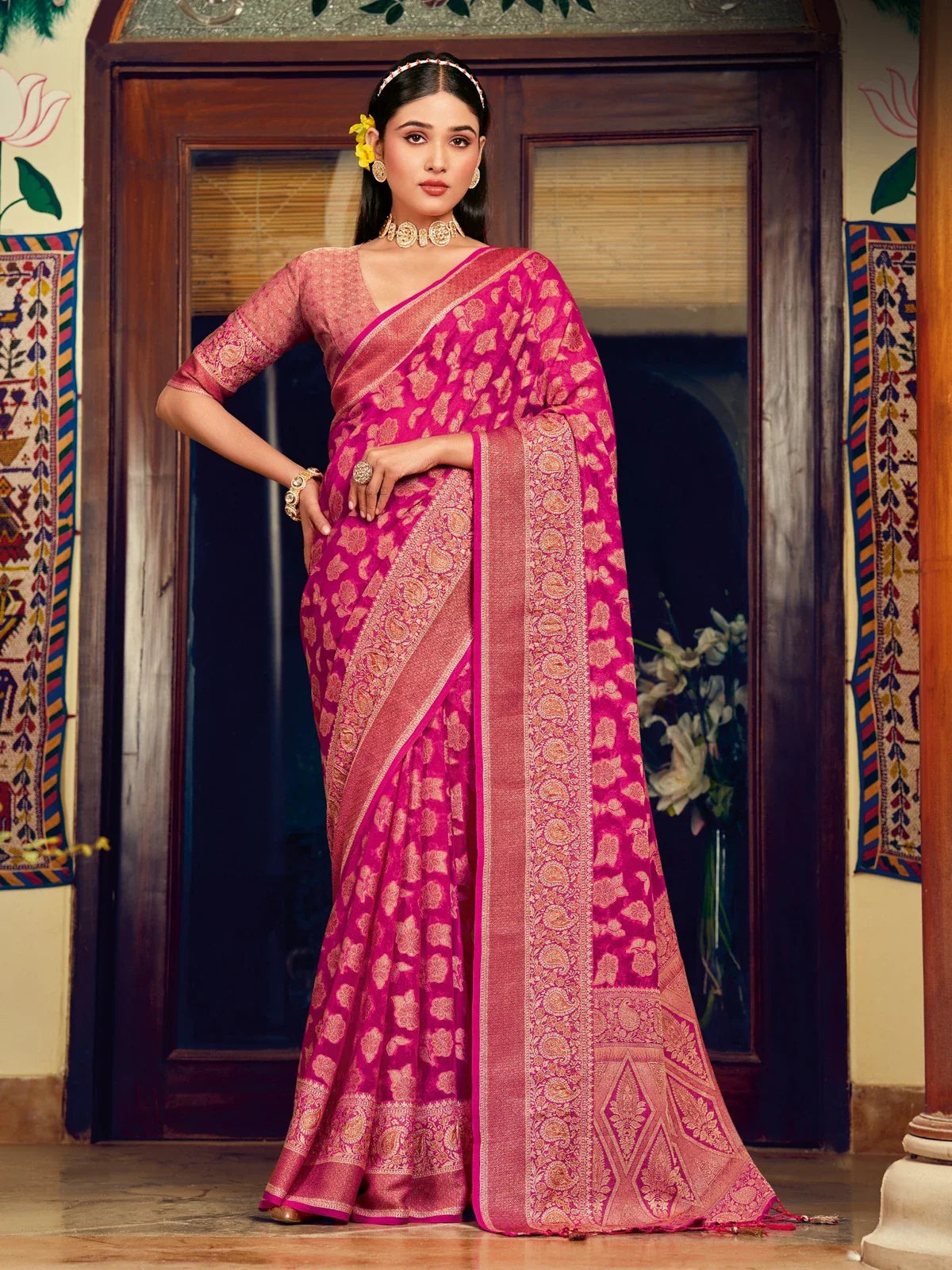 Tarani premium pink georgette saree full view with woven buta and zari border