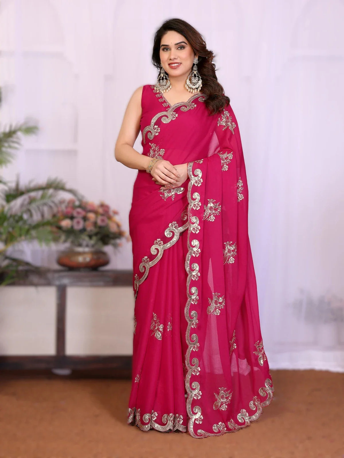 Tarani pink georgette saree with silver embroidered border and blouse for festive or wedding wear