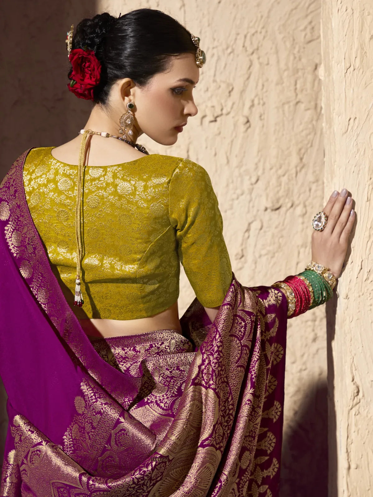 Tarani purple georgette saree back blouse view with contrast mustard golden blouse