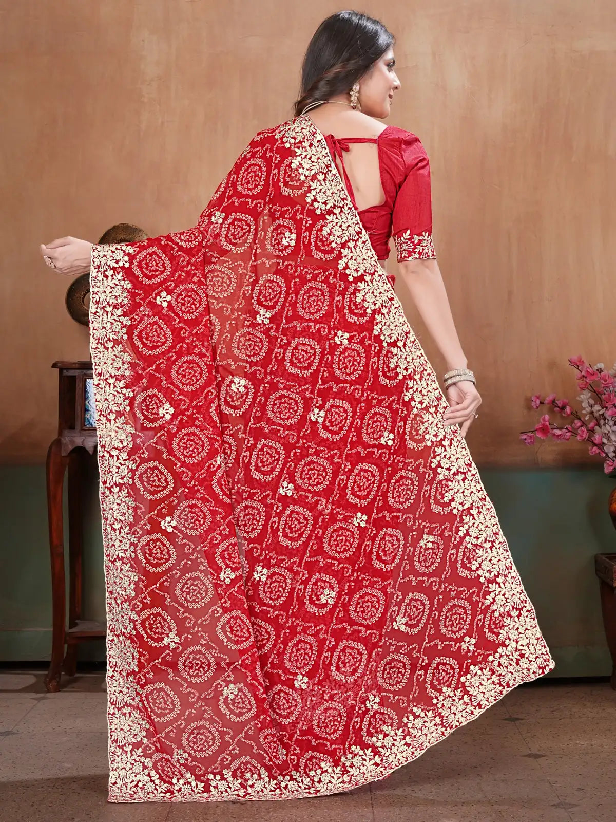 Tarani red georgette saree back view showing pallu and embroidery