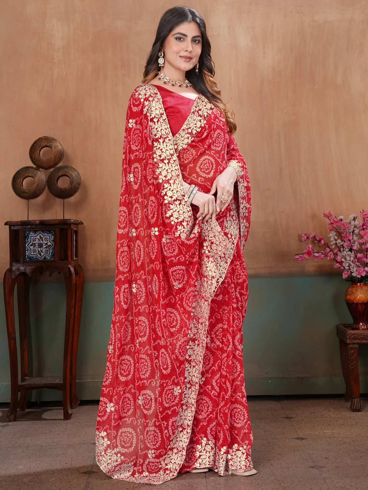 Tarani red georgette saree elegant front pose with embroidered border