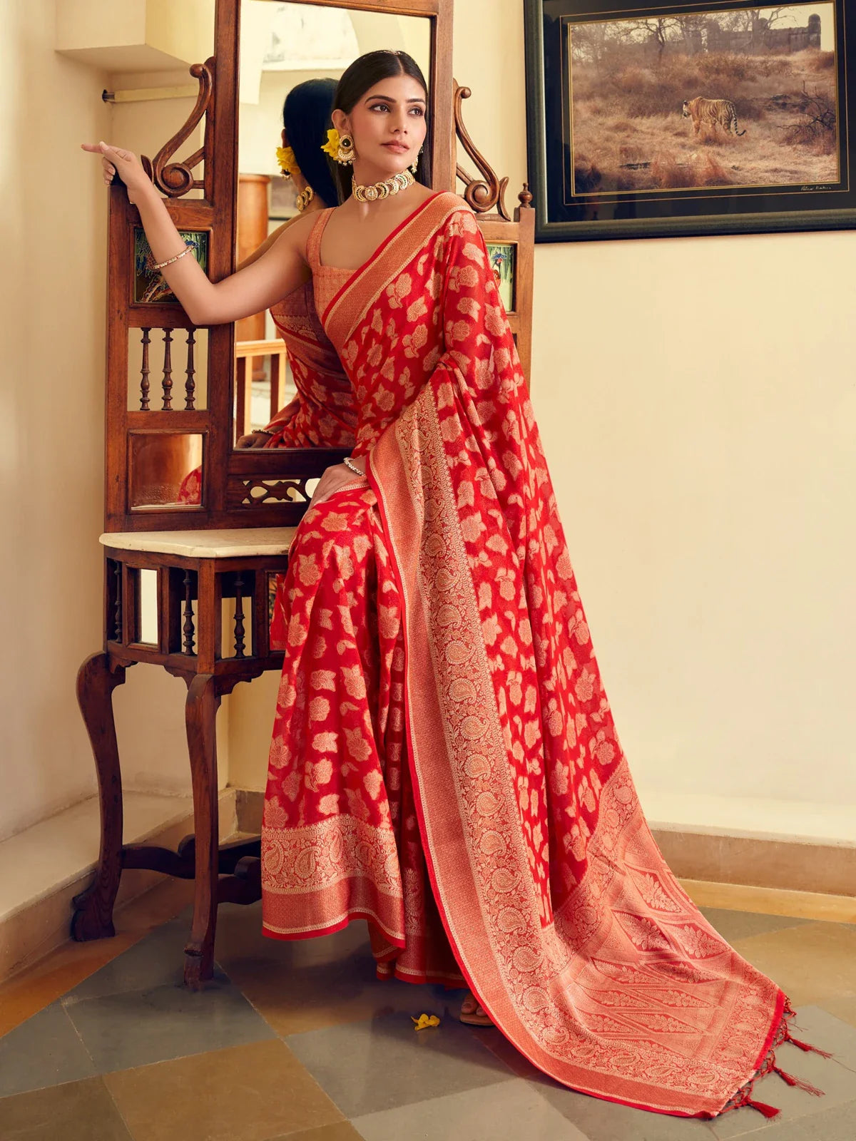 Tarani premium red georgette saree full view with zari border and woven detailing