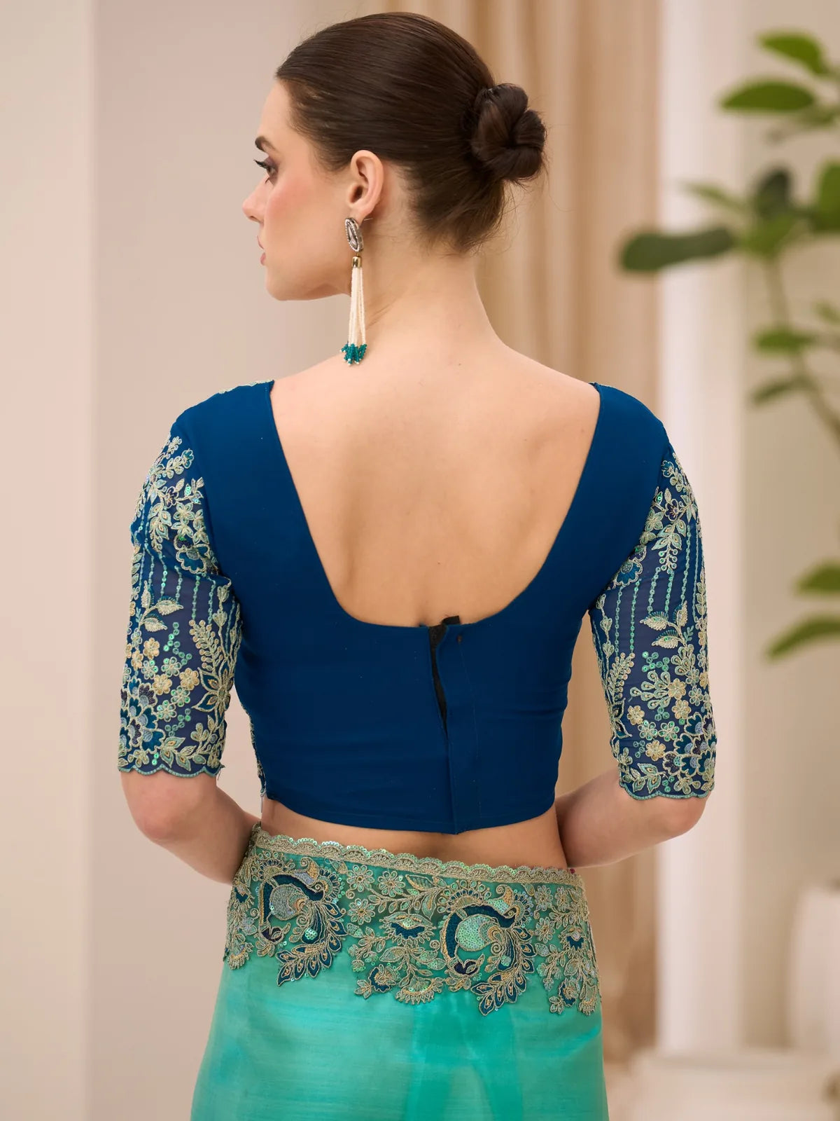 Tarani embroidered blouse back view with teal saree Arshiya