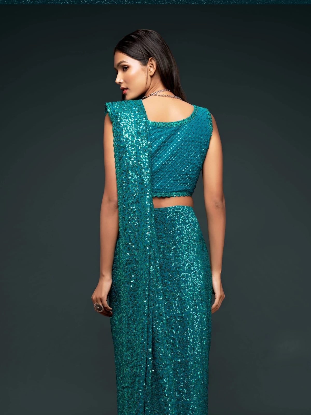 Tarani teal georgette saree back blouse view with elegant sequins embroidered detailing