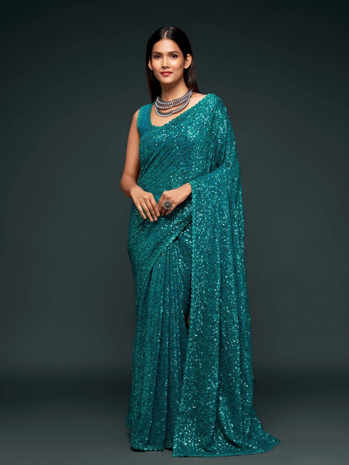 Tarani teal georgette saree with sequins embroidery full view for party and festive wear