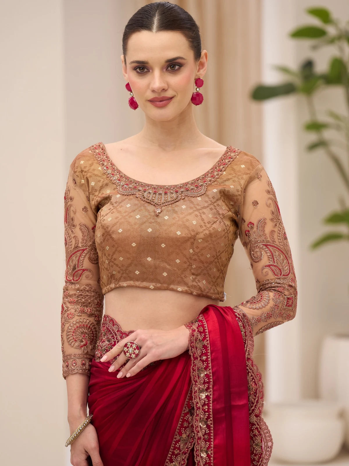 Tarani Prema magenta saree upper body view showing embroidered brocade blouse and designer border