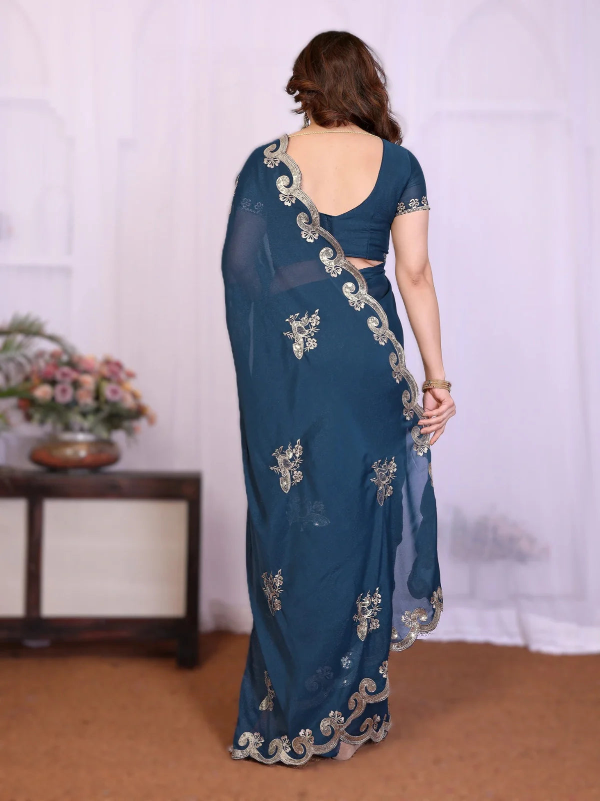 Tarani navina Navy Blue Georgette saree drape detail view for festive party and wedding wear