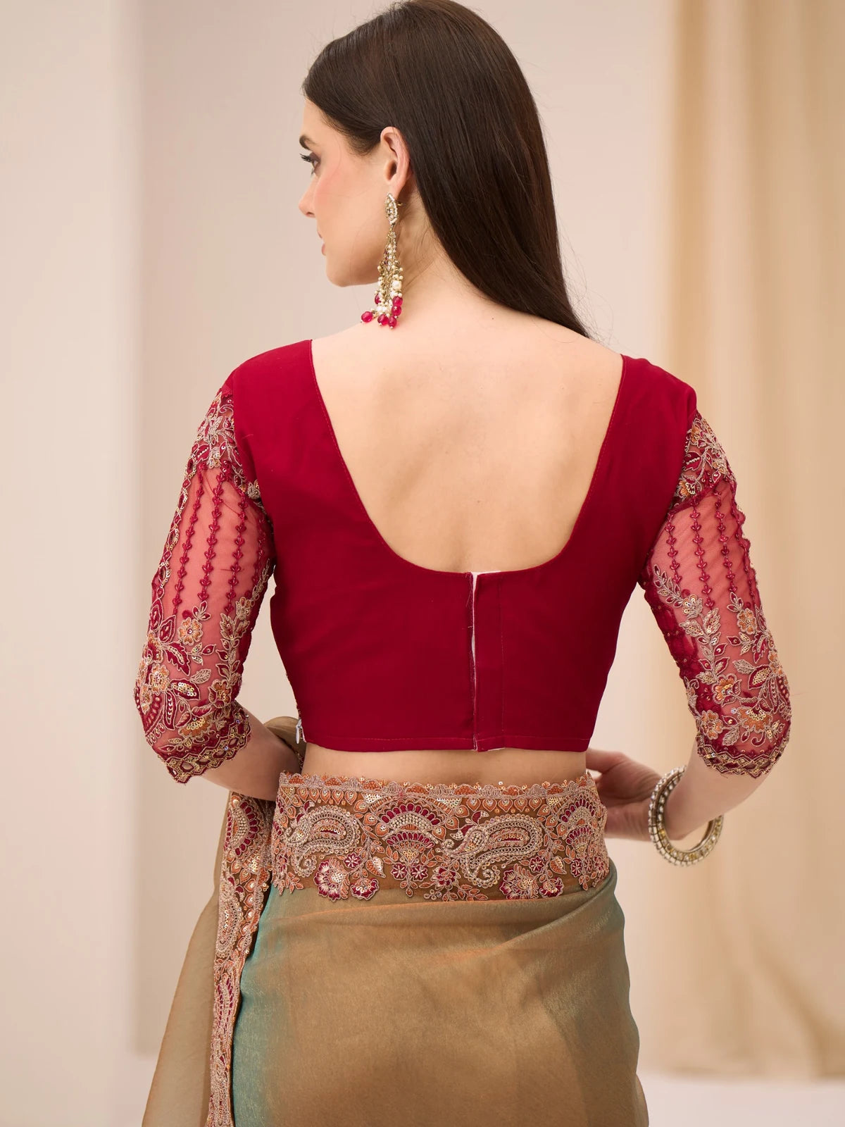 Tarani Sohamika blouse back view with embroidered sleeves and saree border design