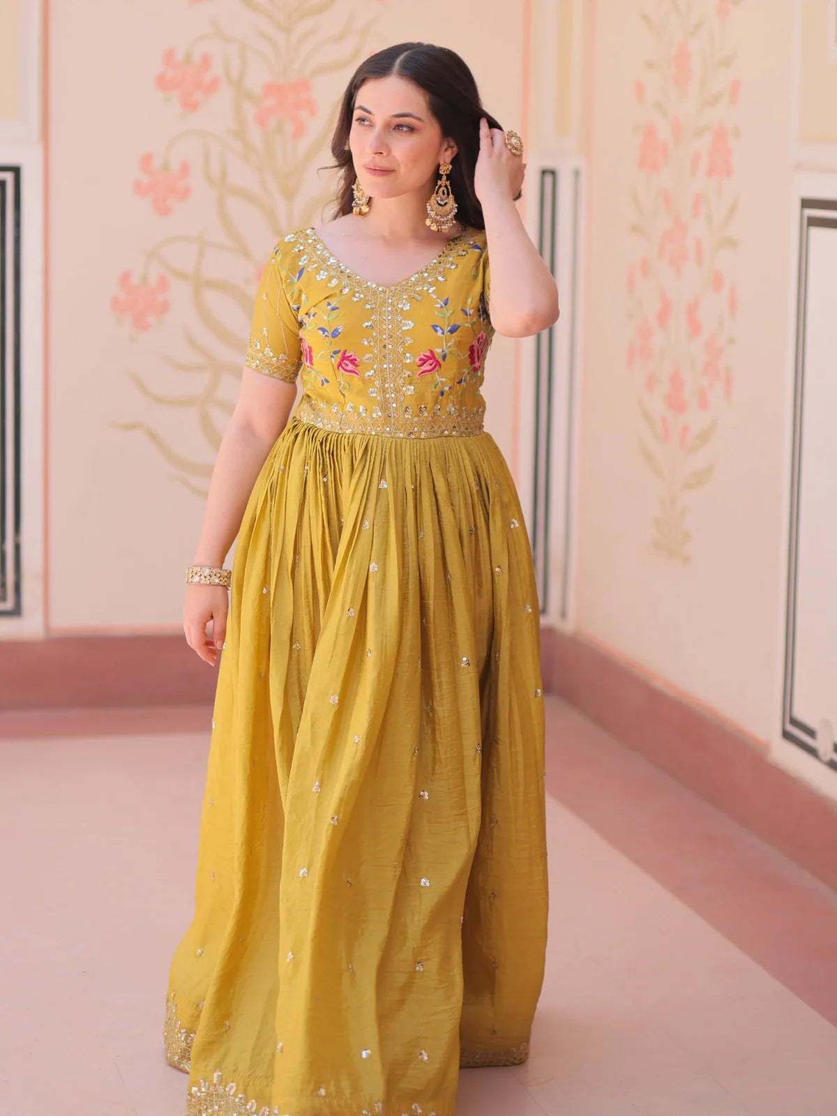 Tarani gold crush yellow gown full length view with zari embroidered hemline