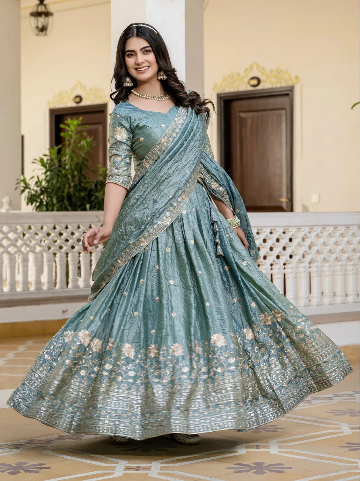 Tarani elegant green lehenga front view with heavy embroidery design