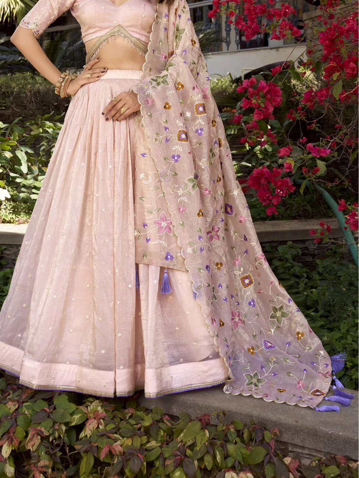 Tarani peach gold crush lehenga closeup embroidery and lace border detailing
