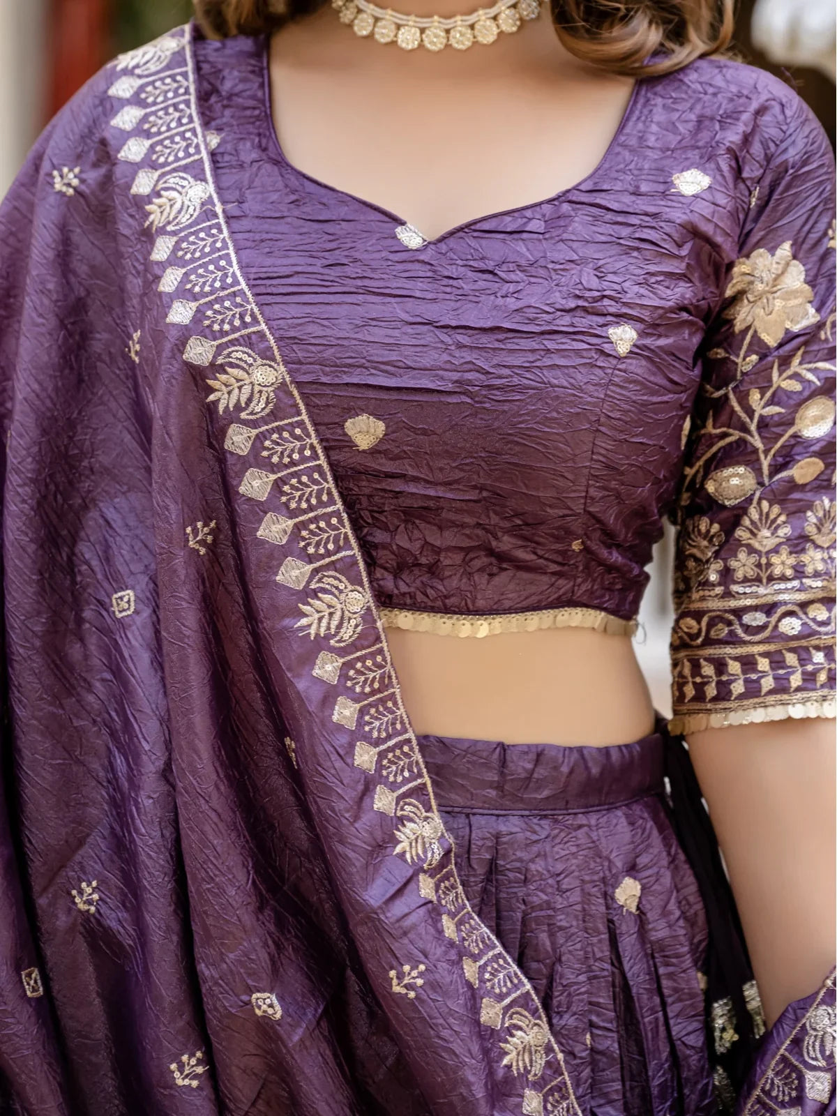 Tarani purple gold crush lehenga blouse closeup with zari embroidery work
