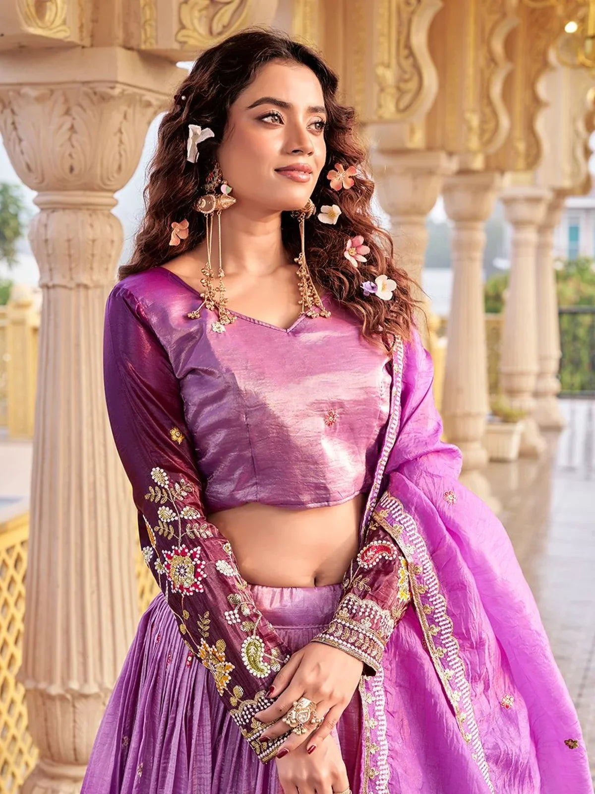 Tarani purple gold crush lehenga set showing embroidered blouse closeup